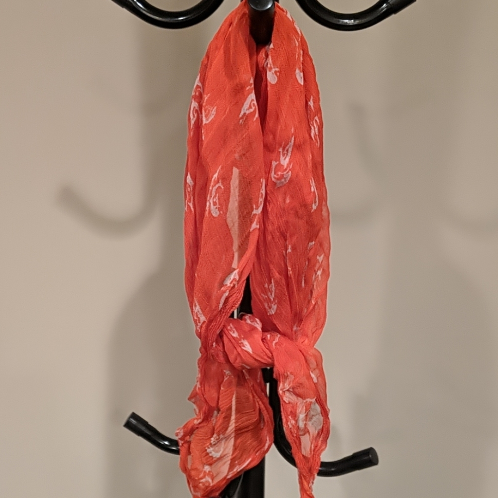 Orange square scarf with white dolphins
